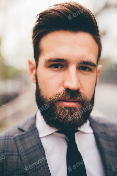 Preview: Young elegant professional executive bearded businessman posing outdoors confident and reassuring