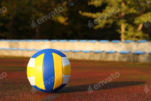 Preview: View of colorful ball on volleyball court outdoors