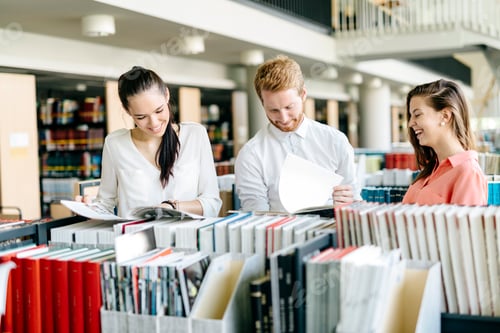 Preview: Group of students studying in library