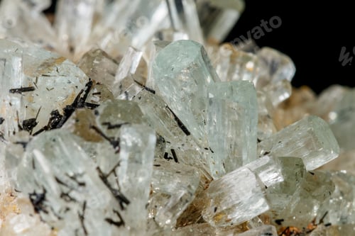 Preview: Macro mineral stone crystals Aquamarine in rock on a black background