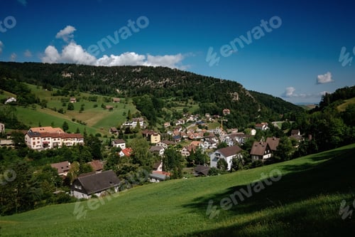 Preview: Summer view of a beautiful apline village in Switzerland