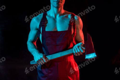 Preview: cropped view of shirtless fireman holding flat head axe on black