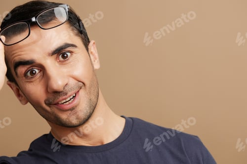 Preview: Cheerful man gray t-shirt glasses cropped view emotions cropped view
