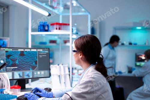 Preview: Specialist scientist pharmacology working on computer in hospital vaccine engineering