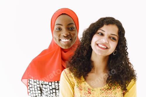 Preview: African and Asian women together on white background