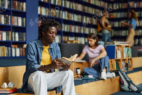 Preview: Black Young Man in Library
