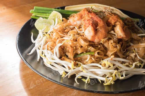 Preview: Close up plate of Padthai, Thai noodle with fried shrimp and vegetable,Thai Food