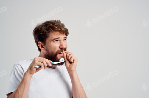 Preview: man hygiene toothpaste morning light background