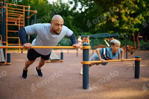 Preview: Father and child doing exercise, sport training