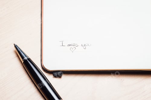 Preview: Note book with the words "i miss you"