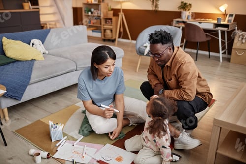 Preview: Parents with Little Daughter in Living Room