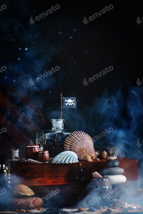 Preview: Glass bottle with pirate flag and seashells