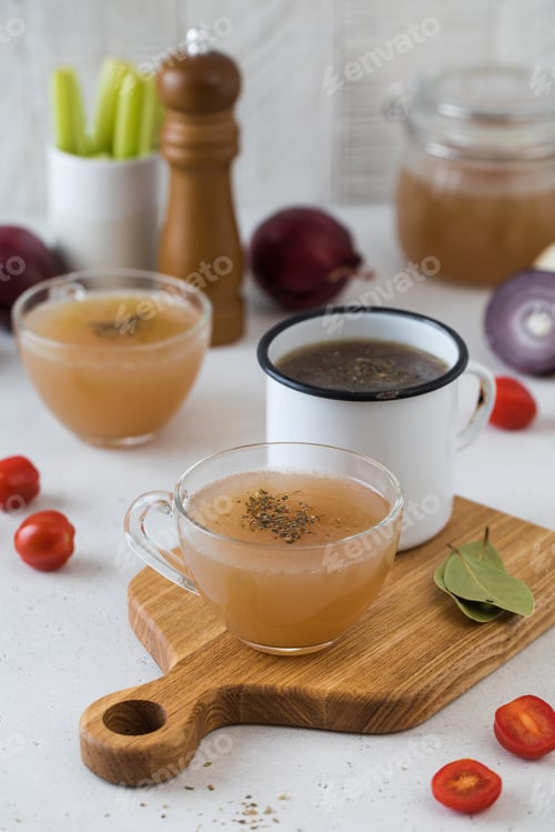 Preview: Healthy homemade bone broth. The concept of keto diet and healthy eating.