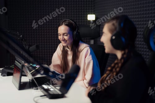 Preview: Women speaking during radio program in studio
