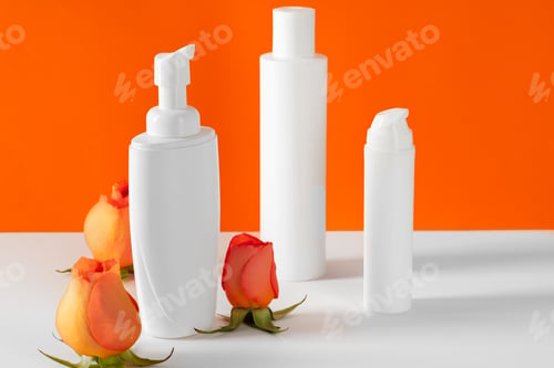 Preview: Cosmetic bottles with rose petals, copy space