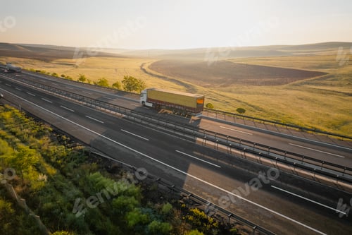 Preview: Aerial view of cargo trailer truck with copy space.