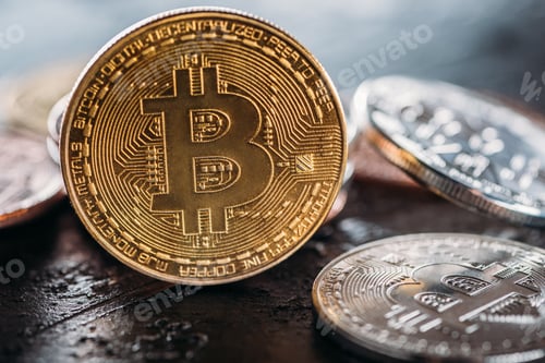 Preview: selective focus of various bitcoins on dark surface