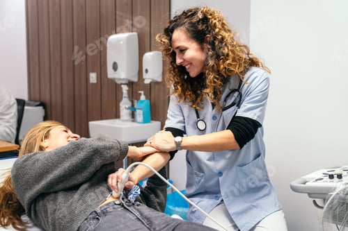 Preview: Caring Ultrasound Technician Comforting Patient