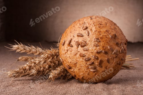 Preview: Loaf of bread and wheat ears still life