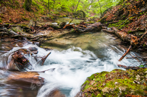 Preview: Mountain waterfall covered in fog
