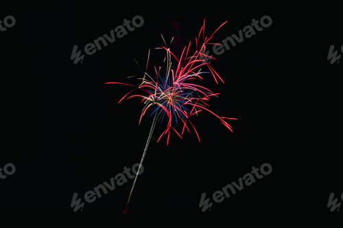 Preview: Closeup shot of colorful fireworks in the dark night sky - celebration concept