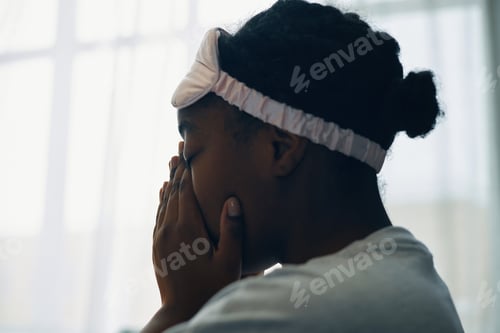 Preview: Woman Covering Face with Hands in a White Sleep Mask