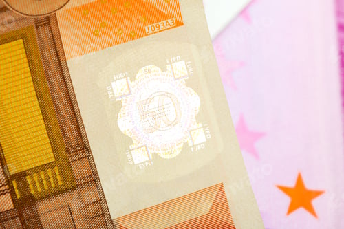 Preview: Currency note showing detailed design and security features with soft background