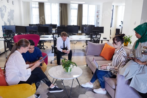 Preview: Multiethnic startup business team having team building