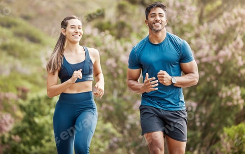 Preview: Fit young man and woman running together outdoors. Interracial couple and motivated athletes doing