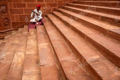Preview: Street musician playing music instrument