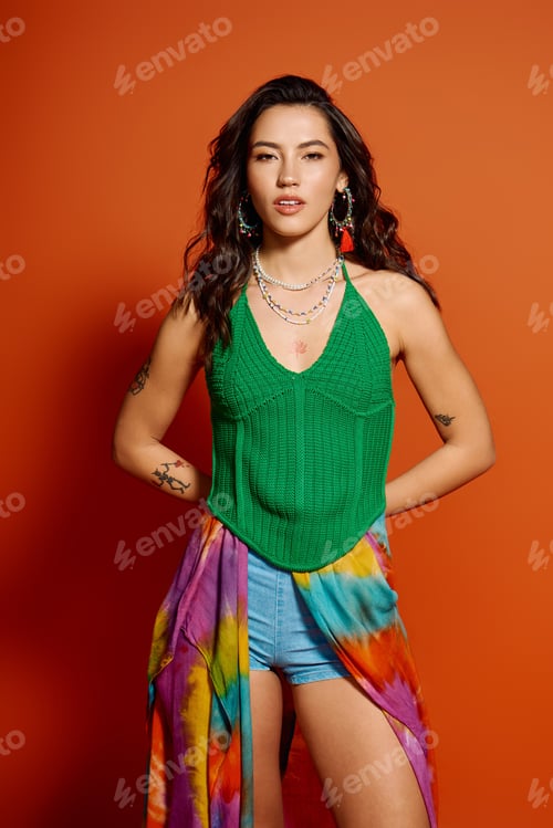 Preview: Beautiful woman radiates summer vibes with vibrant attire in a bright backdrop