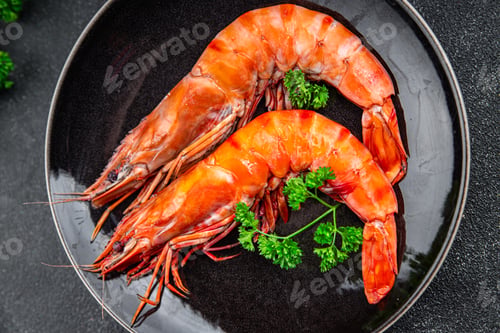 Preview: langoustine large shrimp gambas prawn eating cooking appetizer meal food snack on the table