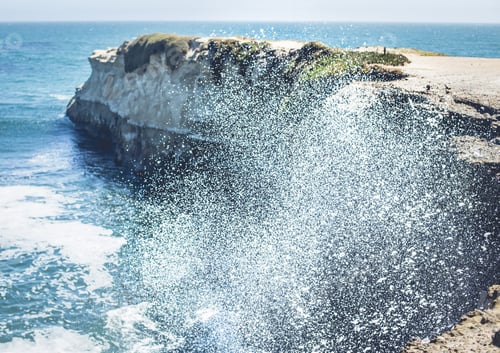 Preview: Water with splashes near coast in sunny day