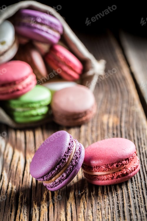 Preview: Tasty macaroons on wooden background
