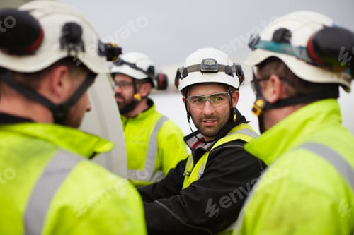 Preview: Engineers working on wind turbine