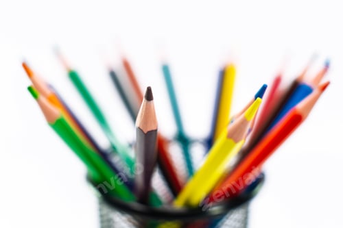 Preview: Colored pencils in a pencil case on white background