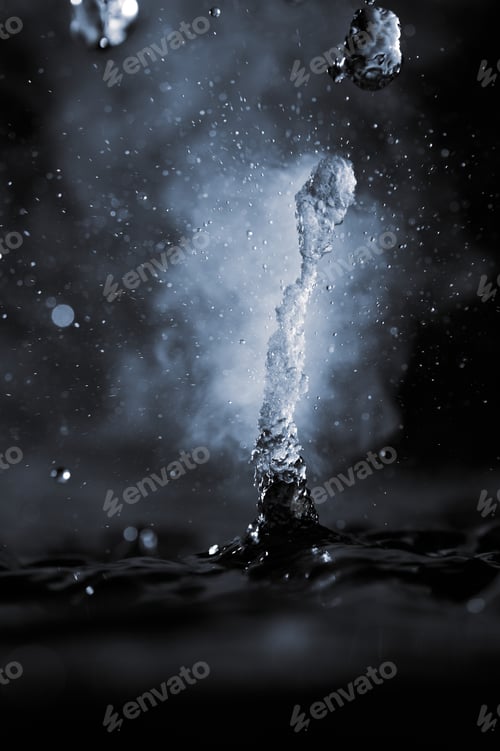 Preview: Boiling water splash with steam on black background closeup