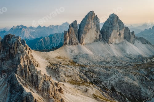 Preview: Epic aerial view of Tre Cime di Lavaredo during sunset, Dolomites, Italy