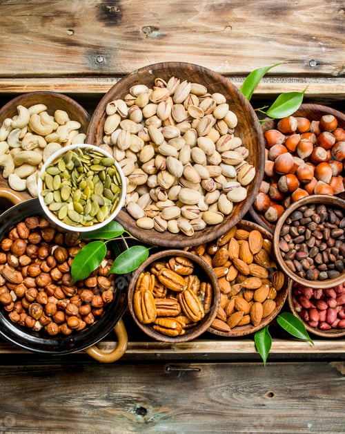 Preview: Assortment of different nuts in bowls.