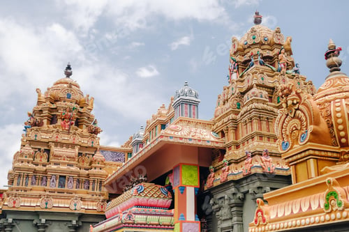 Preview: Part of a beautiful and colorful Indian temple in Mauritius Island. Close-up on sculptures and