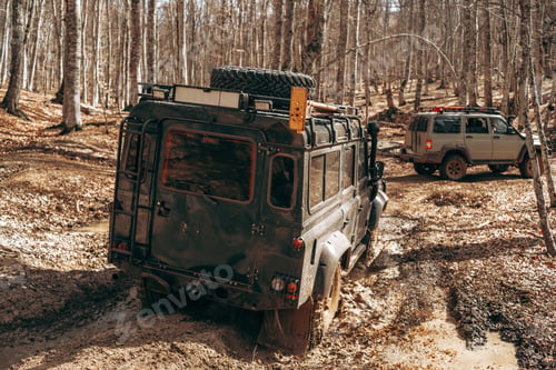 Preview: Offroad car driving through the forest road of mud