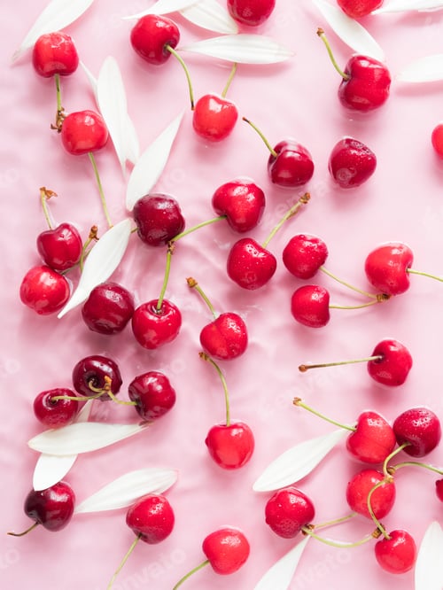 Preview: Cherry berry pattern with flowers and petals in water on pink background