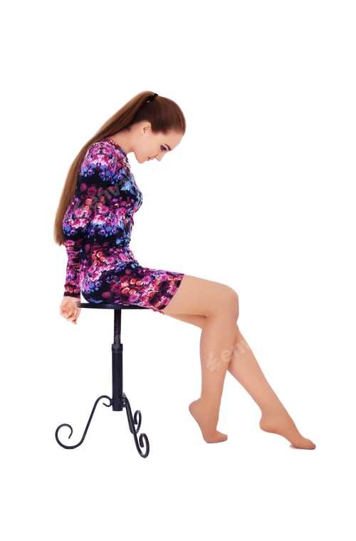 Preview: Young girl with very long hair sitting on a chair. The concept o