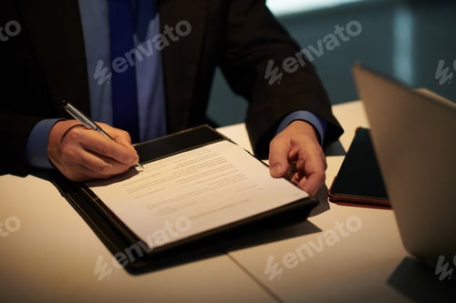 Preview: Entrepreneur Signing Important Documents