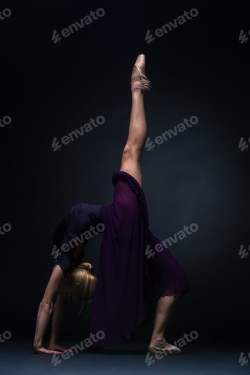 Preview: Young Beautiful Modern Style Dancer Posing On A Studio Background
