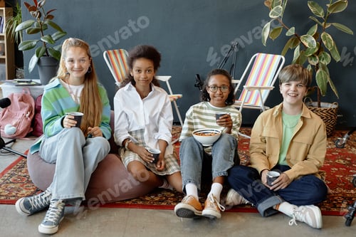Preview: Group of children sitting on bean bags