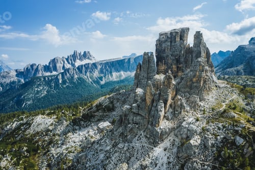 Preview: Aerial view of Cinque Torri in Dolomites mountains in Italy. Epic landscape on a sunny day of summer
