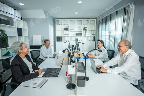 Preview: Group of Asian elderly businessman and businesswoman working in office.