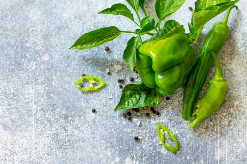 Preview: Green peppers paprika background and Mexican hot chili peppers.