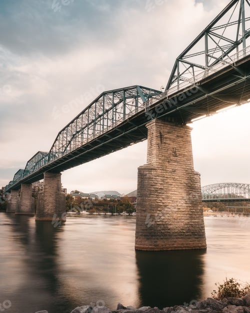 Preview: Vertical shot of Walnut Street Bridge under cloudy sky in Chattanooga, Tennessee, USA